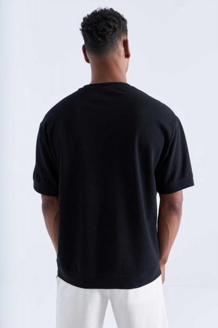 T-shirt oversized Zwart